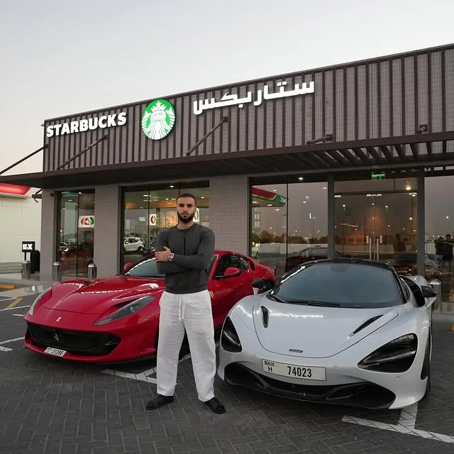 Hassan with a Ferrari and McLaren